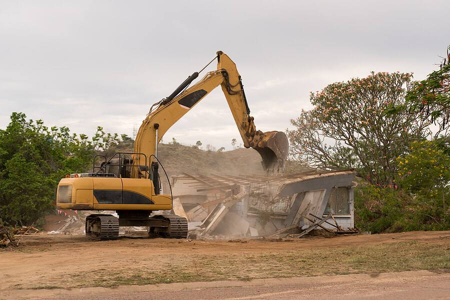 an AClass Building crane knocking down a home