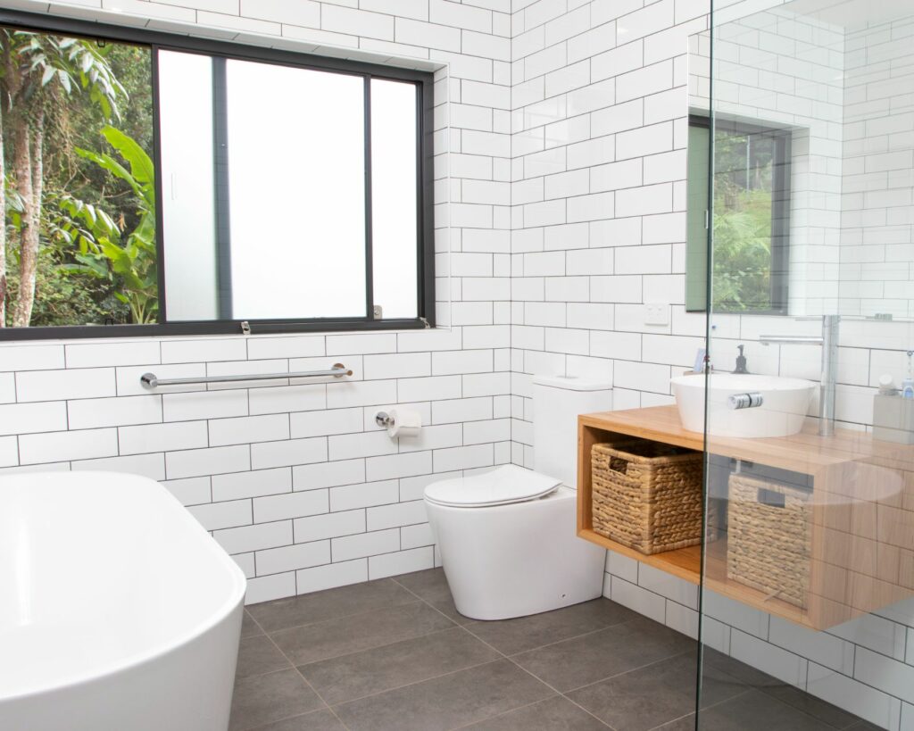 Modern bathroom with black and gold tiles