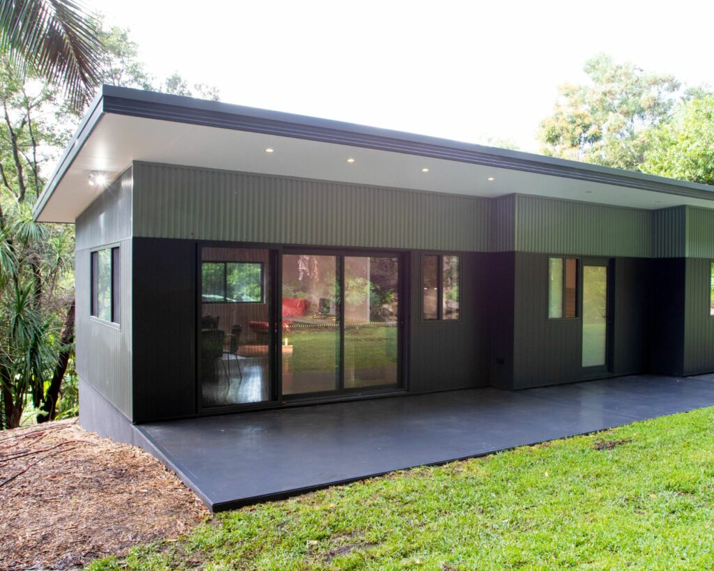 two storey house made of bricks and timber cladding